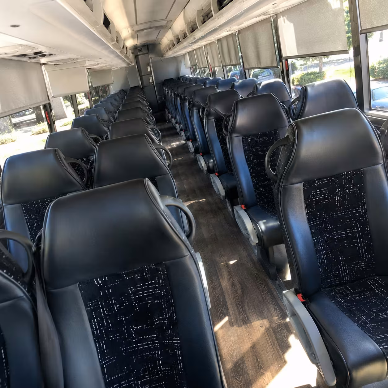 troy charter bus rentals to dtw airport for corporate groups